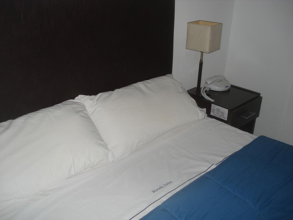 Morada Suites Campana Exterior photo