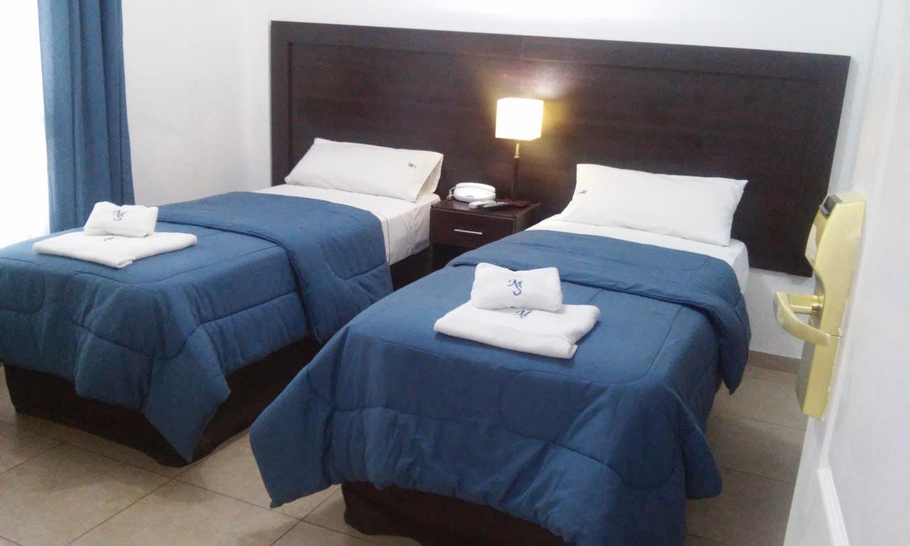 Morada Suites Campana Exterior photo