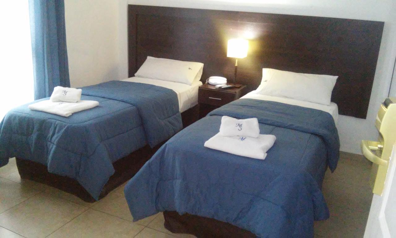 Morada Suites Campana Exterior photo