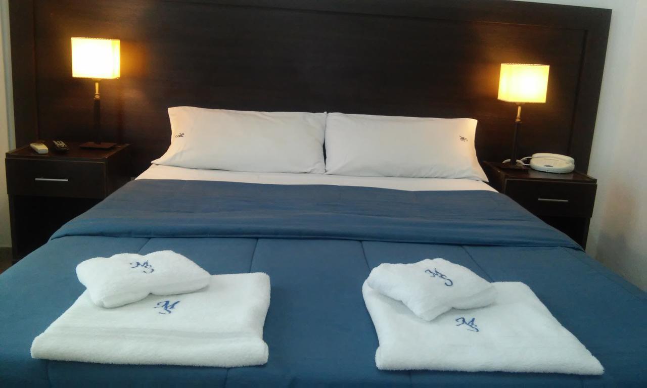 Morada Suites Campana Exterior photo